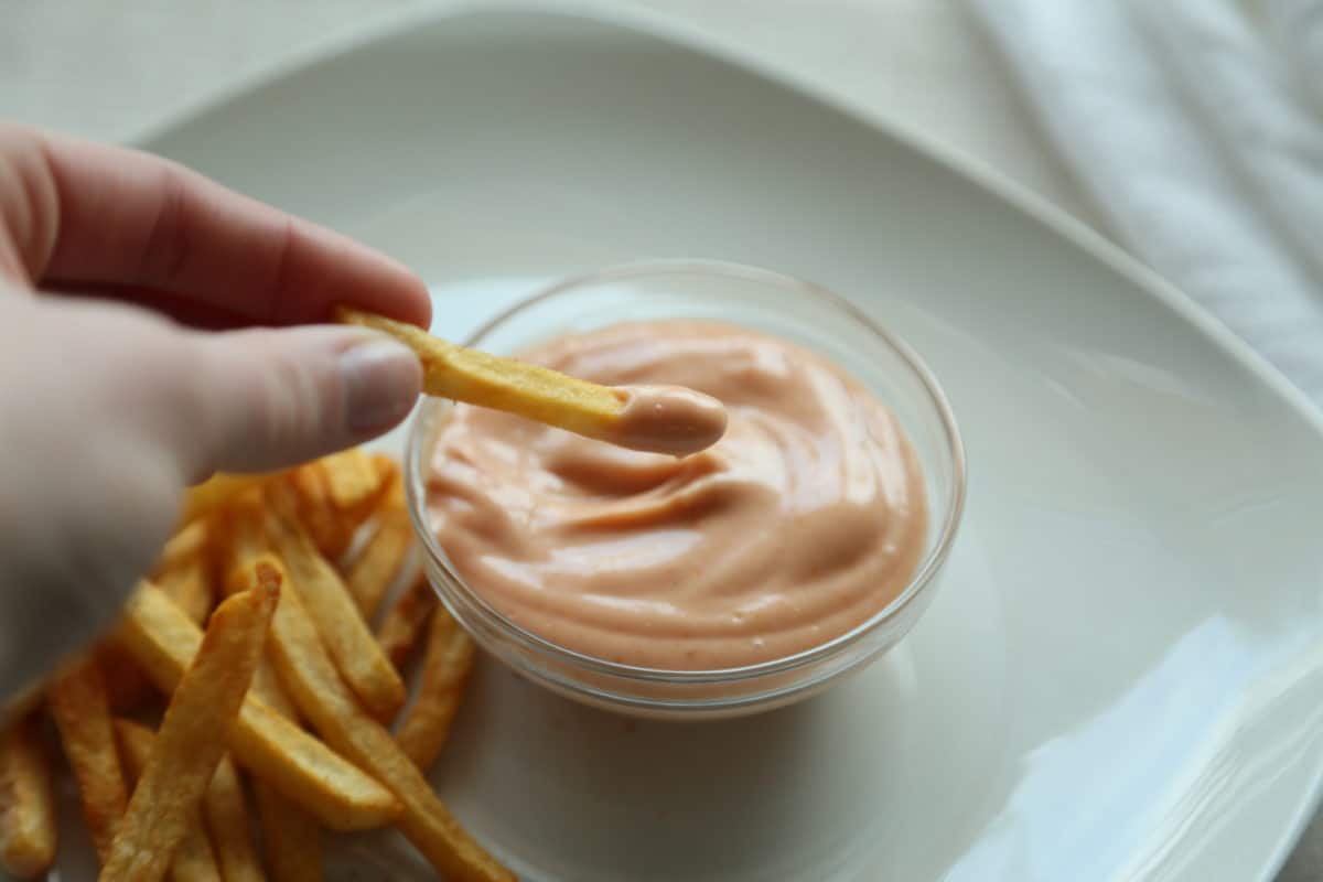 Golden shoestring fries with garlic mayo dipping sauce — the way Pakistanis love it